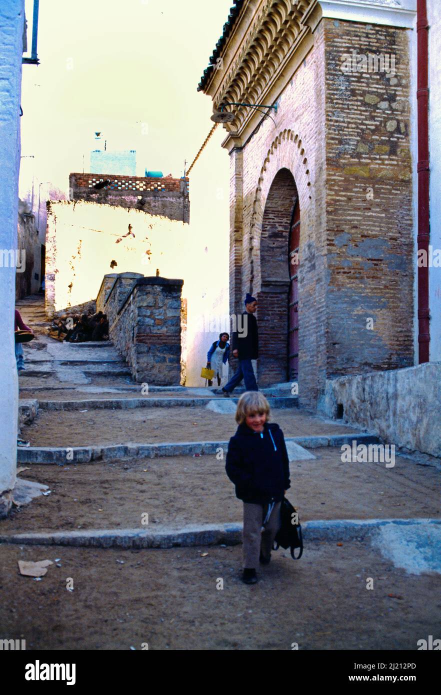 Tlemcen Algeria Young Boy Tourist in back Street Carrying Bag Stock Photo