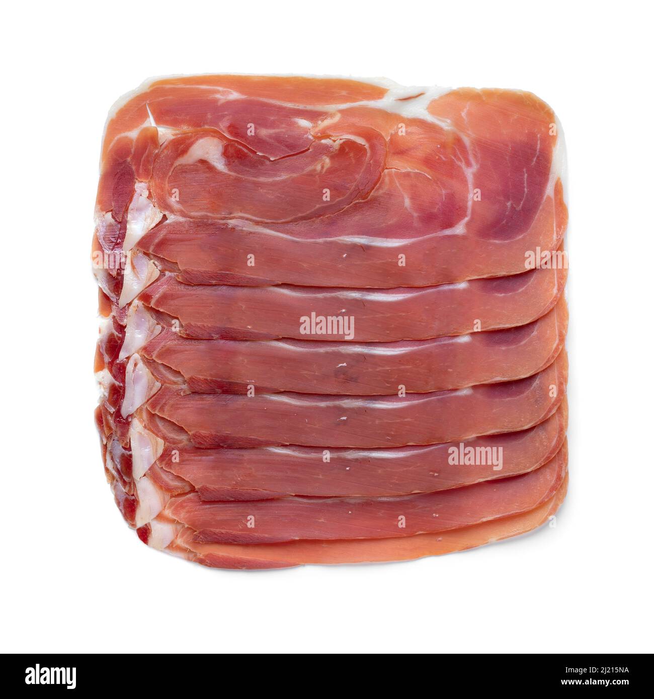 Sliced Spanish raw ham, serrano ham, close up isolated on white background Stock Photo