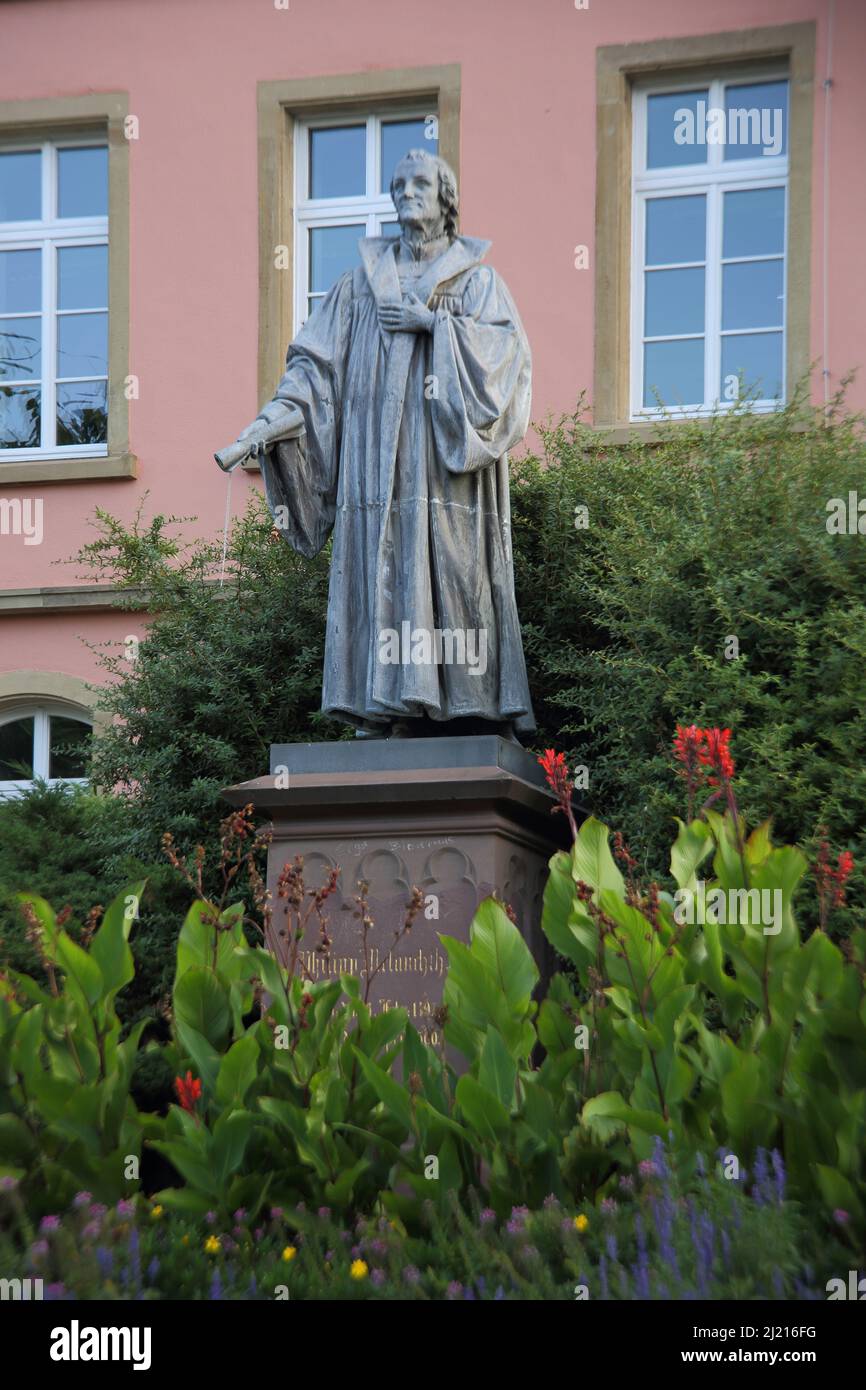 Monument to Philipp Melanchthon 1497-1560 in front of the Melanchthon Gymnasium in Bretten, Baden-Württemberg, Germany Stock Photo