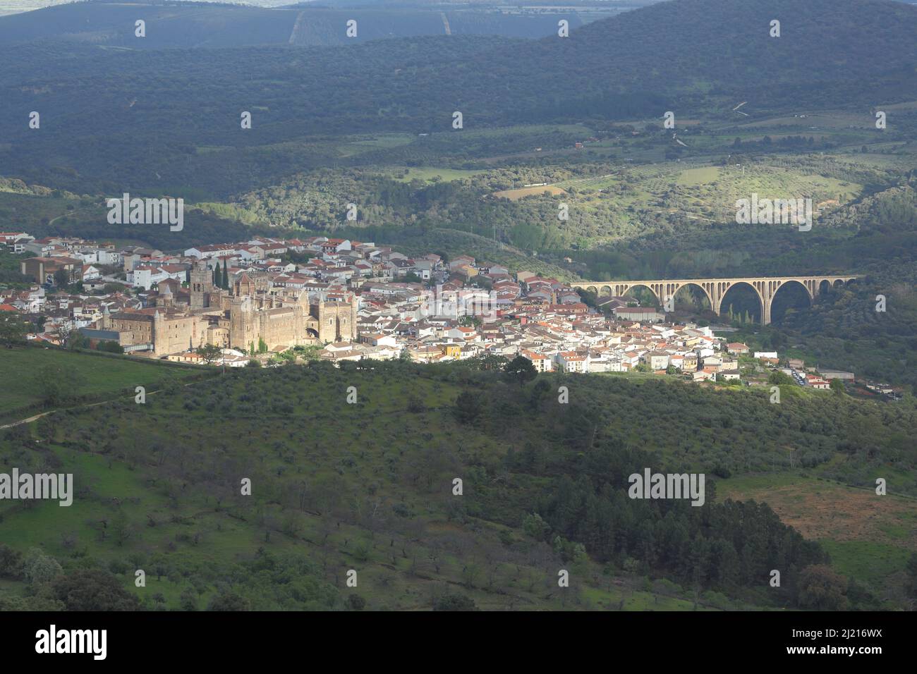 View of Guadalupe with UNESCO Real Monasterio de Nuestra Senora monastery and viaduct, Extremadura, Spain Stock Photo