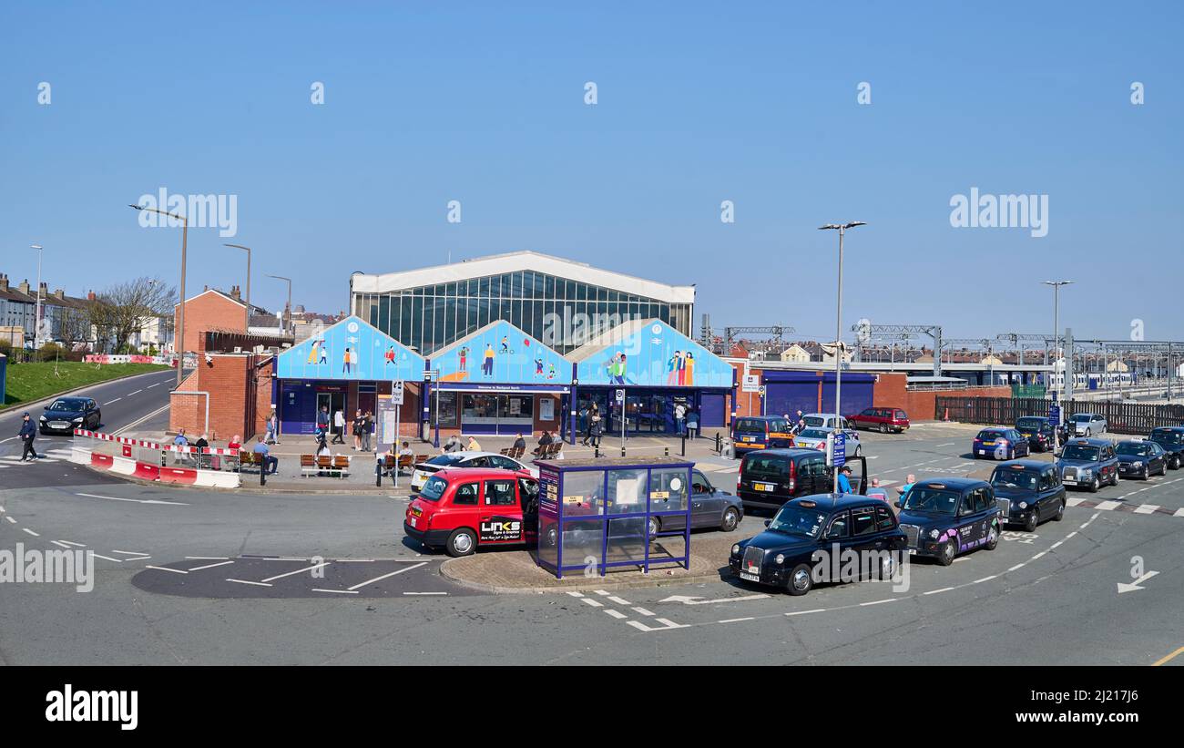 Taxi queue in front of North railway Station,Blackpool,on a sunny spring weekend Stock Photo