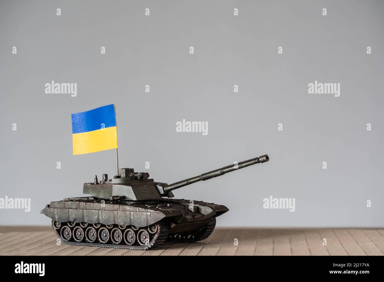 Toy tanks with Ukrainian flags Stock Photo