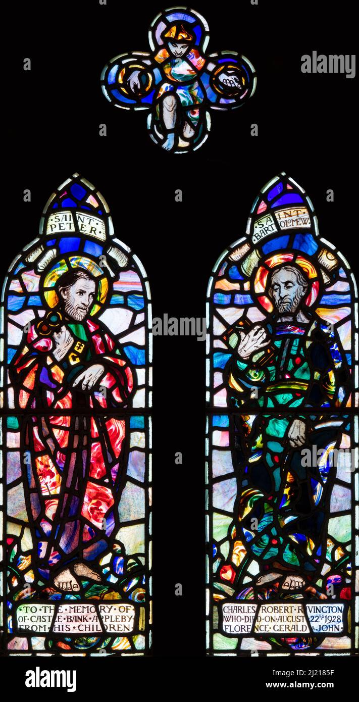 Saints Peter and Bartholomew depicted in stained glass designed by Leonard Walker (1929), St Peter's Church, Great Asby, Central Eden, Cumbria, UK Stock Photo