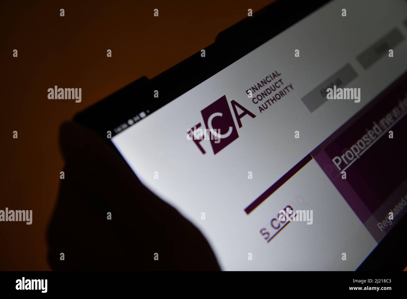 The FCA (The Financial Conduct Authority) website on a tablet Stock Photo