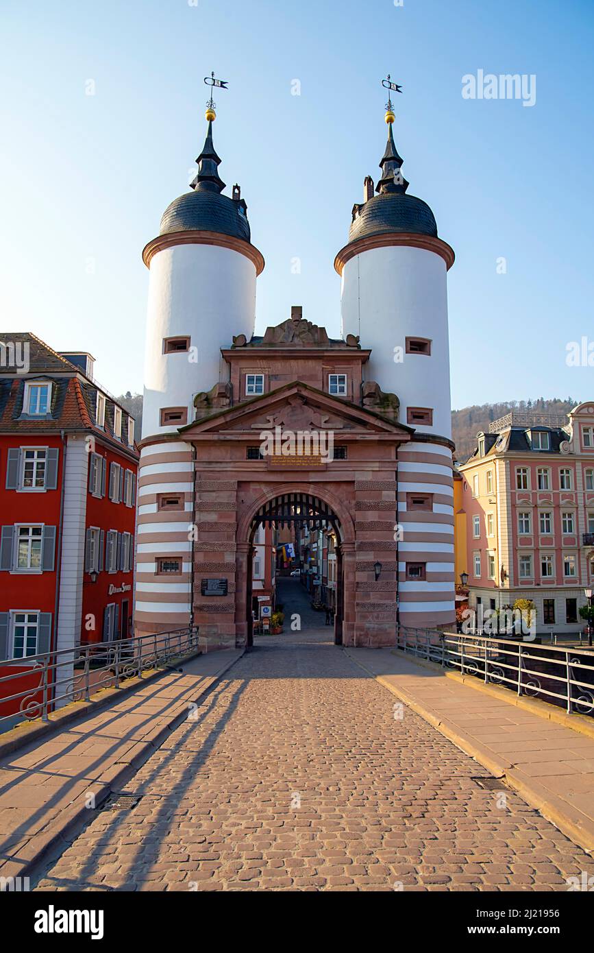 Old Bridge (Karl Theodor Bridge) gate In Heidelberg. Heidelberg is a town on the Neckar River in southwestern Germany. Stock Photo