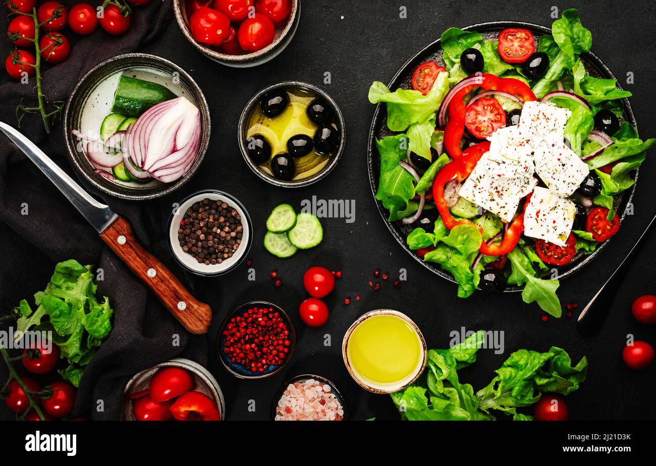 Greek salad with feta cheese, olives, cherry tomato, paprika, cucumber