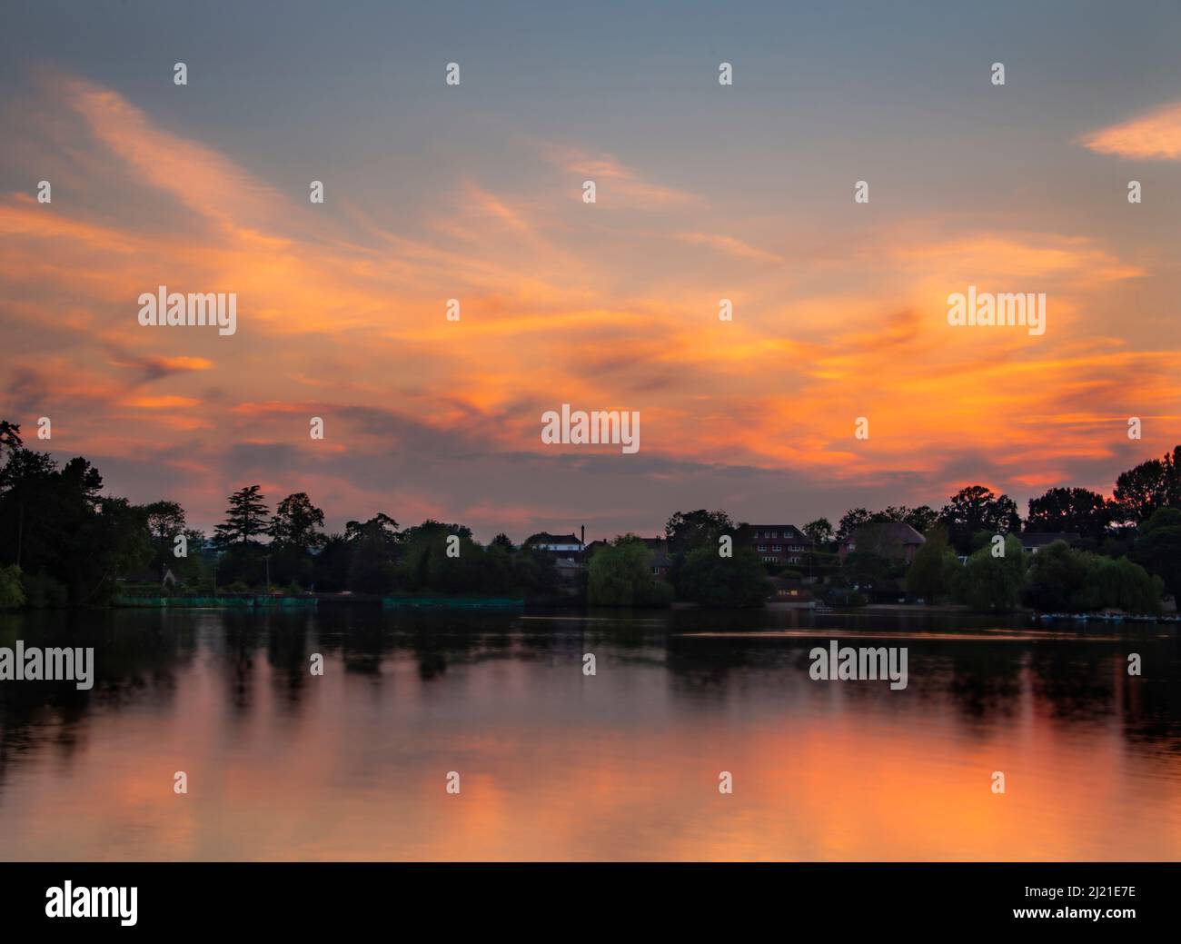 Petersfield lake, England, UK at sunset across the water Stock Photo