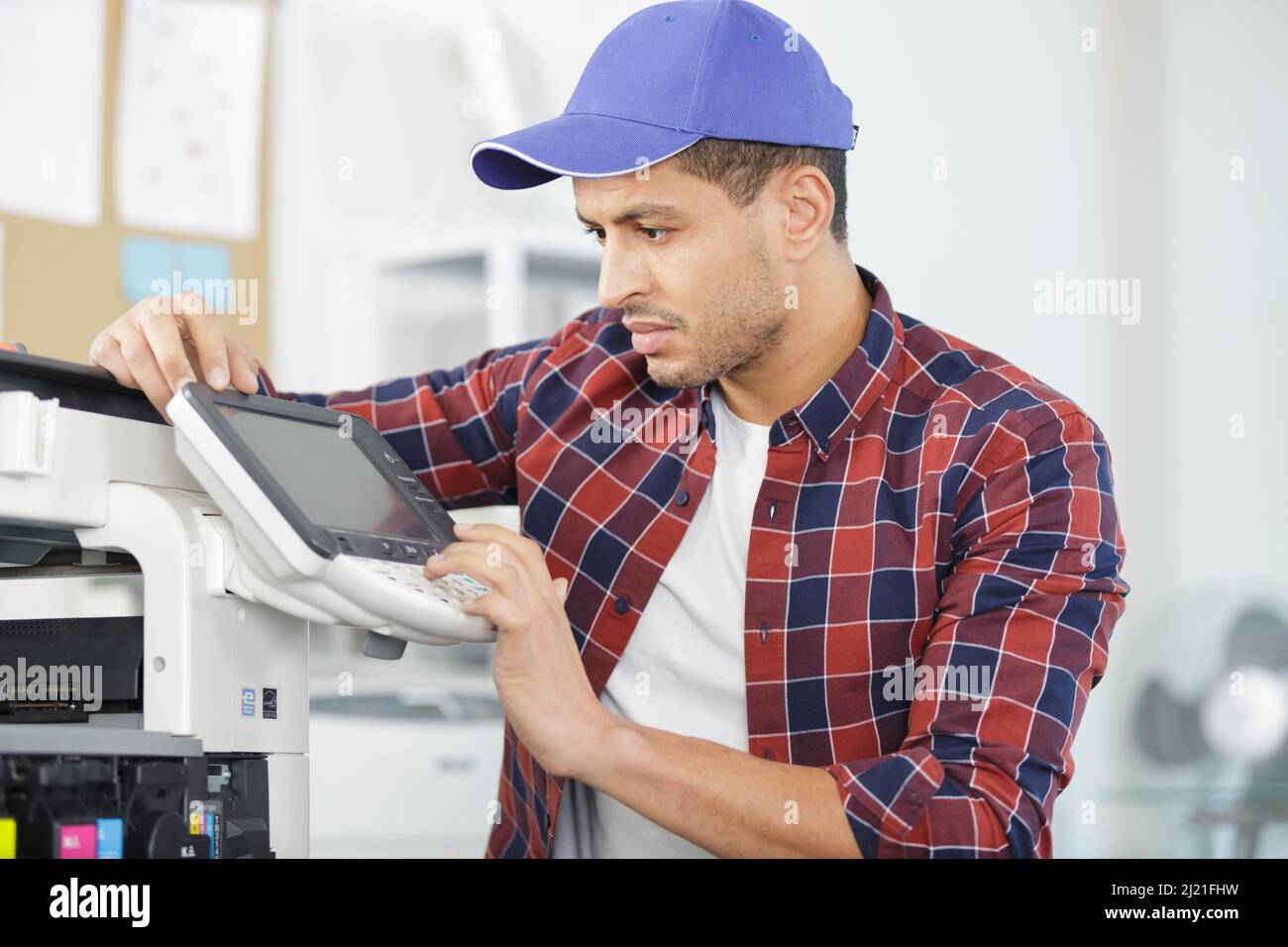 hardware repairman repairing broken printer fax machine Stock Photo Alamy