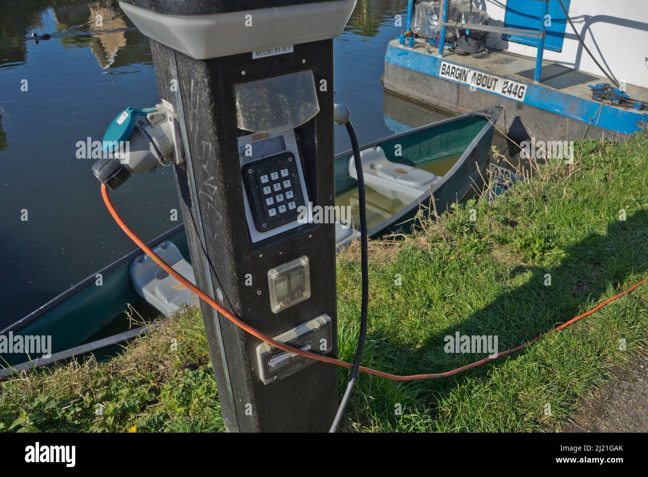 Electric chargers for narrow boats on the Regent's canal by the Olympic Park in the east end of