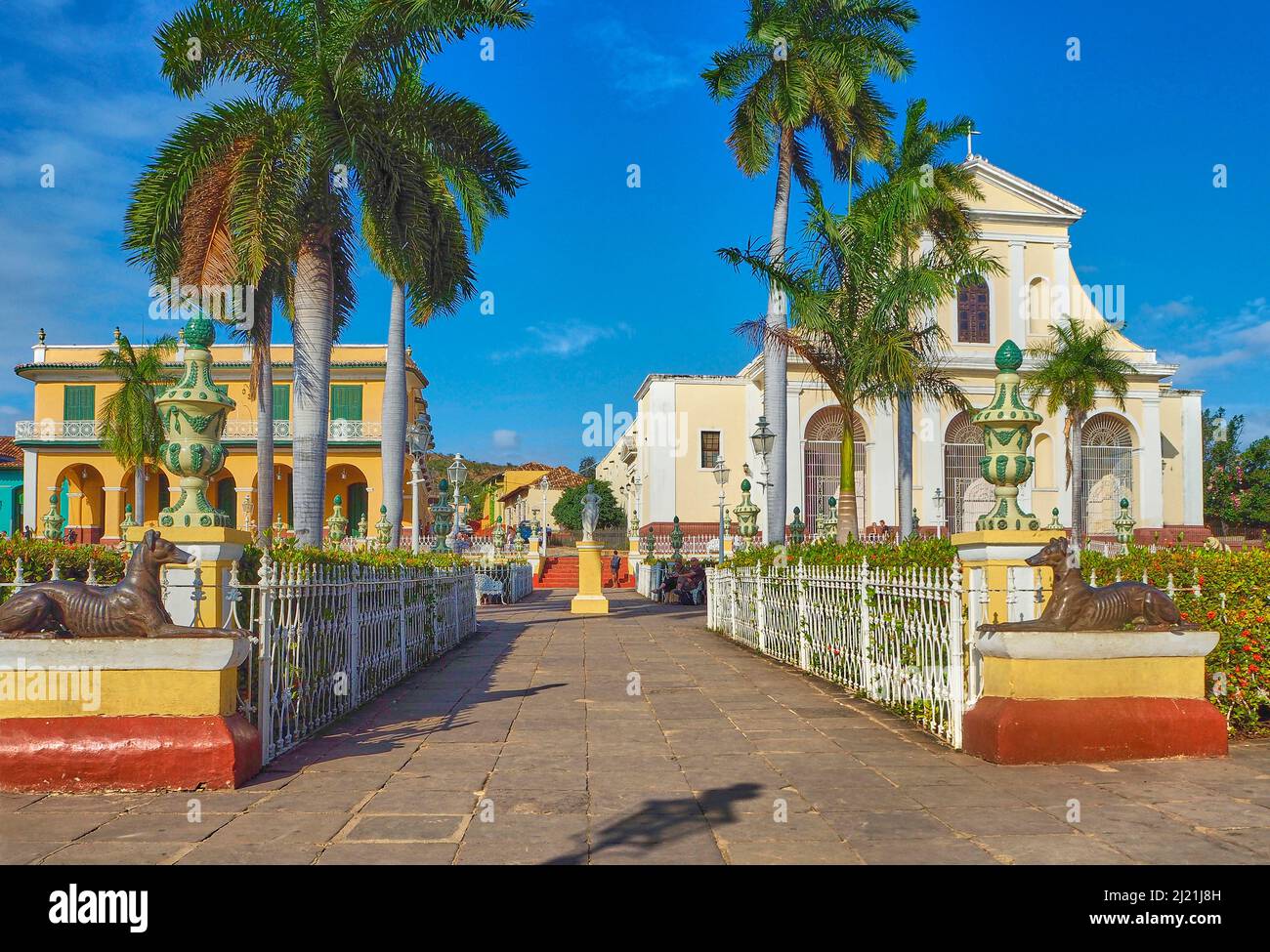 Plaza Mayor in the centre of Trinidad, church Church of the Holy Trinity (right) and Palacio Brunet (left), Cuba, Sancti Spiritus, Trinidad Stock Photo