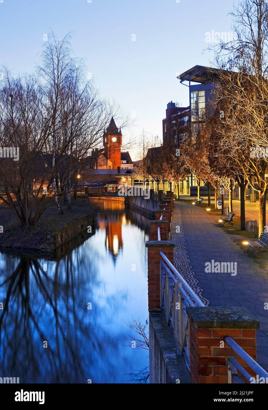 Old town hall tower with river Dinkel in the evening, Germany, North Rhine-Westphalia, Muensterland, Gronau Stock Photo