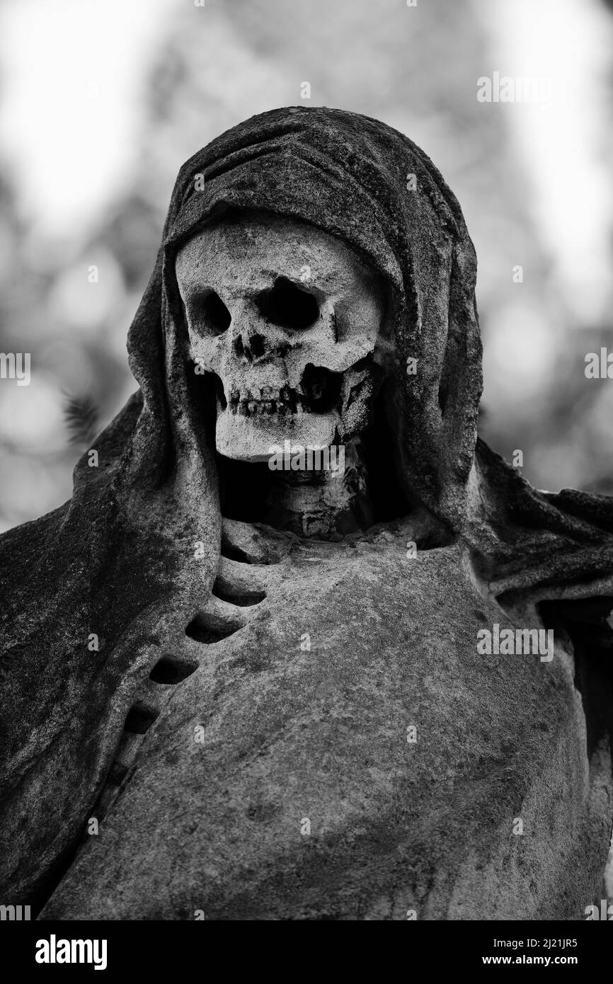 Sculpture Grim Reaper at the Melaten cemetery, Germany, North Rhine-Westphalia, Rhineland, Cologne Stock Photo