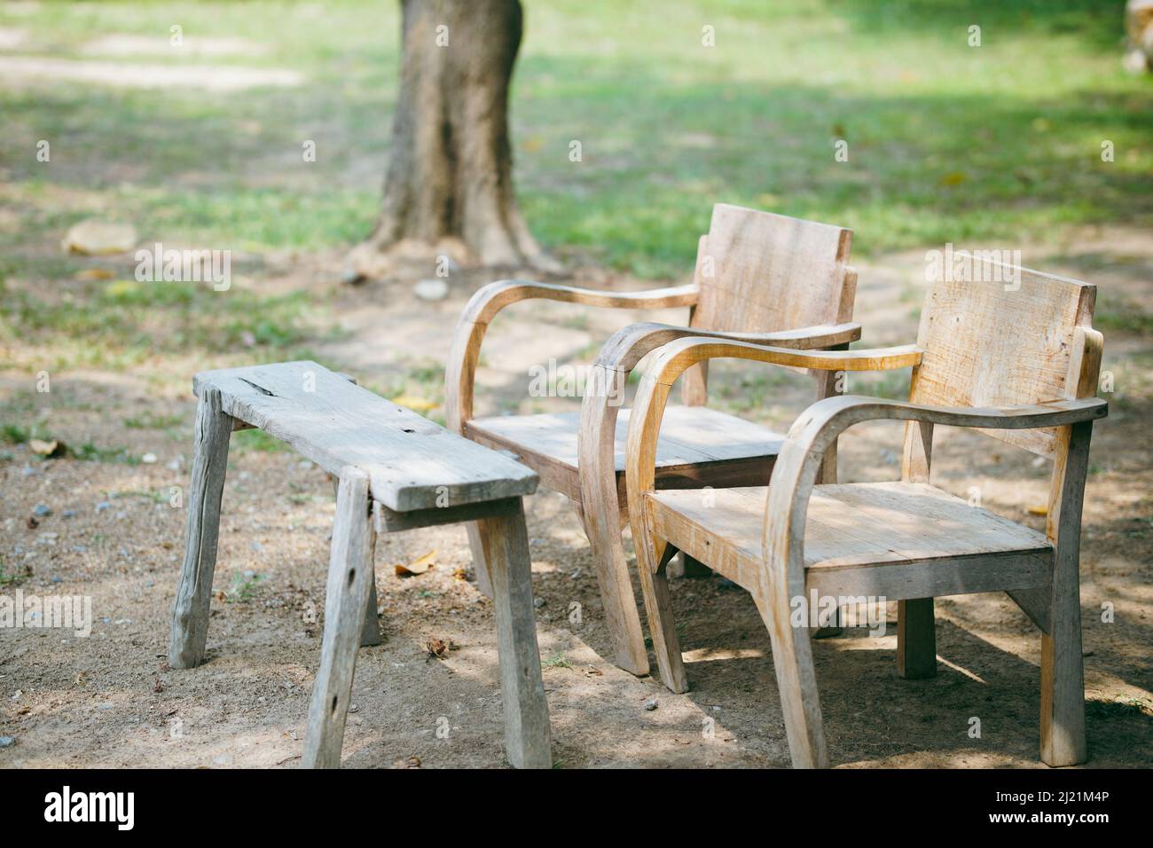 old wooden seat chair in garden park Stock Photo