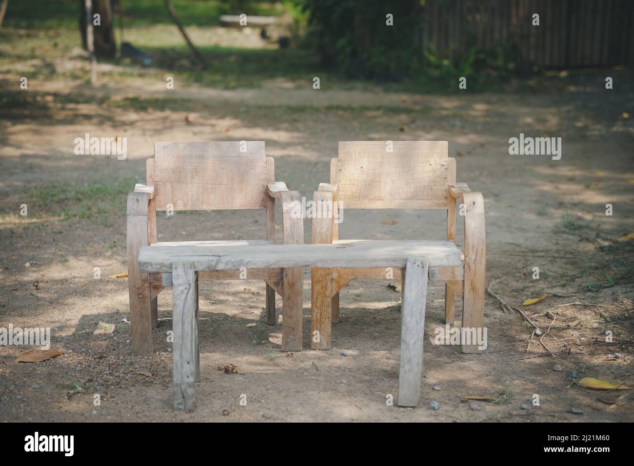 old wooden seat chair in garden park Stock Photo