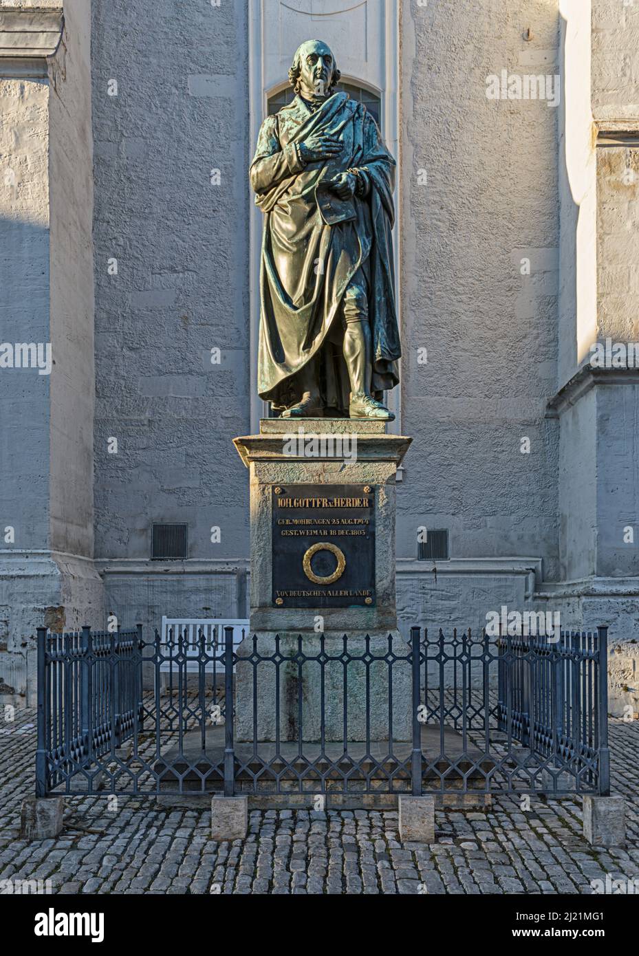 Monument for Johann Gottfried von Herder at Weimar, Geermany. Bronze statue in front of Saint Peter and Paul church on Herder square. Stock Photo