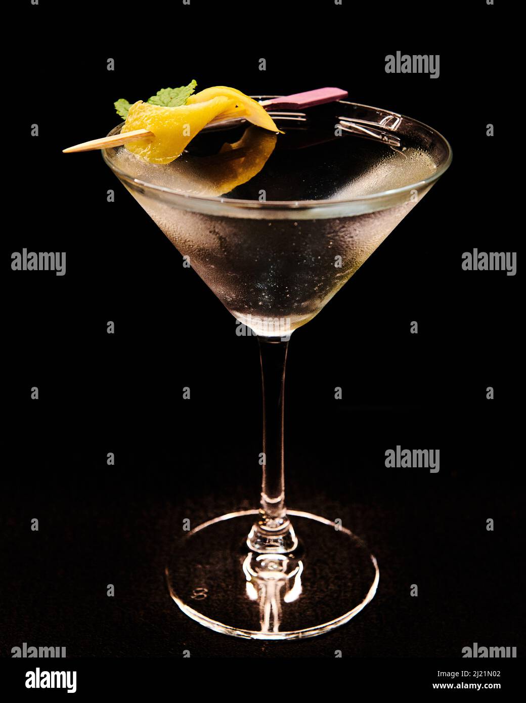 Vesper vodka Martini with a lemon peel garnish Stock Photo