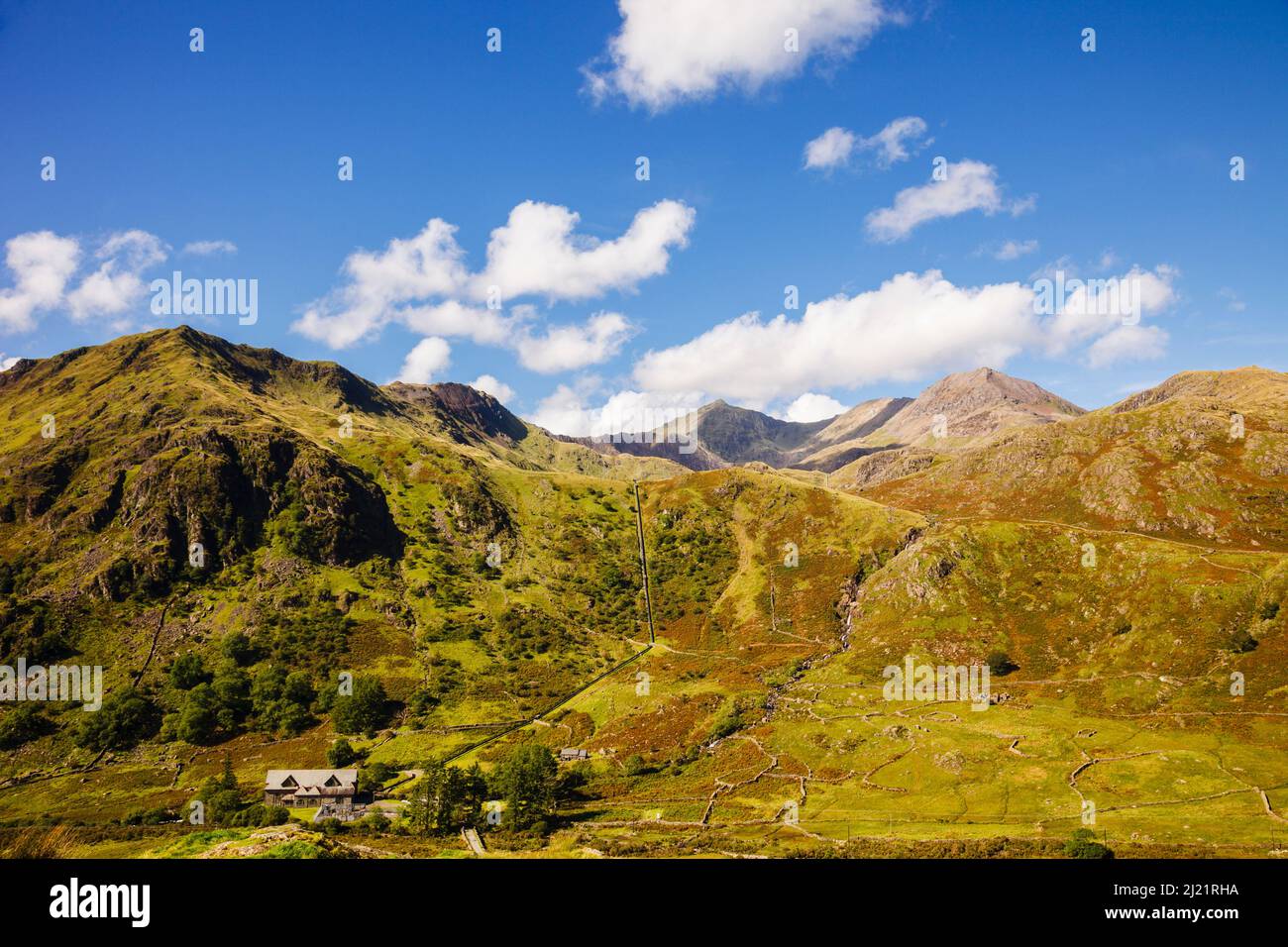 View up Cwm Dyli to mountains of Snowdon horseshoe from viewpoint in Nant Gwynant in Snowdonia National Park. Pen-y-Pass, Gwynedd, North Wales, UK Stock Photo