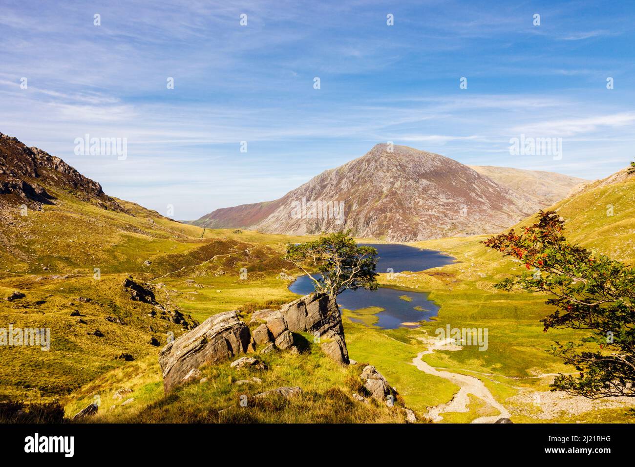 Llyn Idwal in Cwm Idwal National Nature Reserve with Pen Yr Ole Wen mountain beyond in Snowdonia National Park. Ogwen, Gwynedd, North Wales, UK Stock Photo