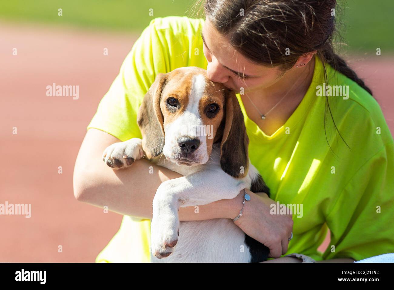 Young girl hugging her dog outdoors in outdoor Stock Photo - Alamy
