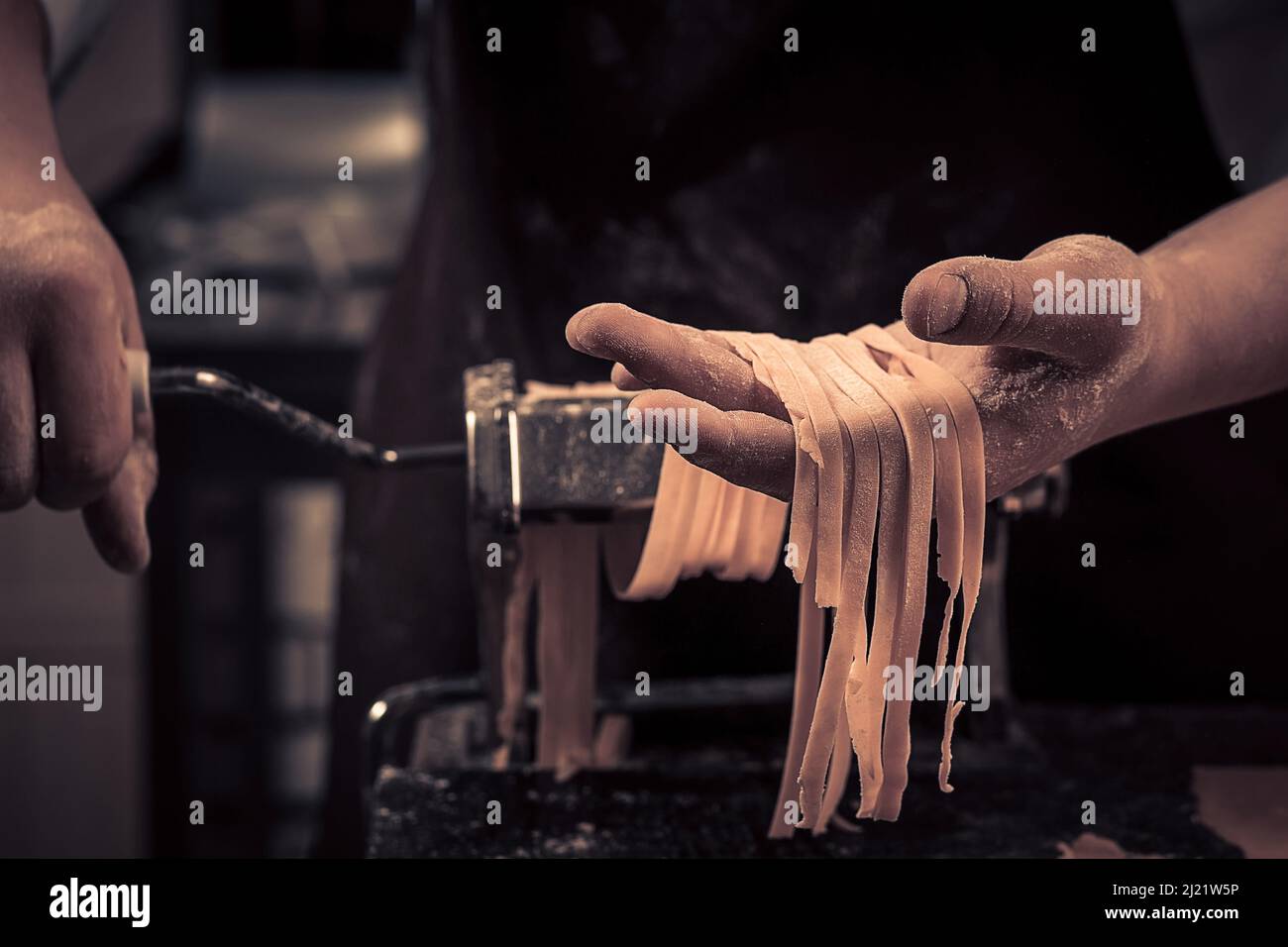 Pasta Thouges For Chef The chef makes fresh spaghetti from scratch Stock Photo - Alamy