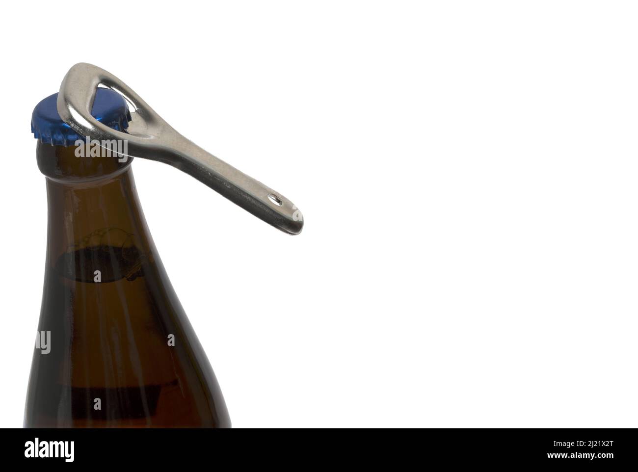 Close up silver retro vintage bottle opener that opens the crown cap of