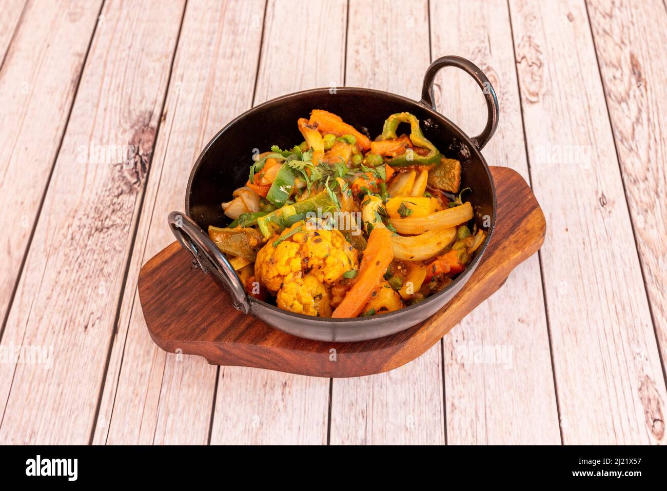 Vegetable jalfrezi is a popular Punjabi vegetable jalfrezi sabzi. vegetable jalfrezi features mixed vegetables cooked in a tomato base Stock Photo