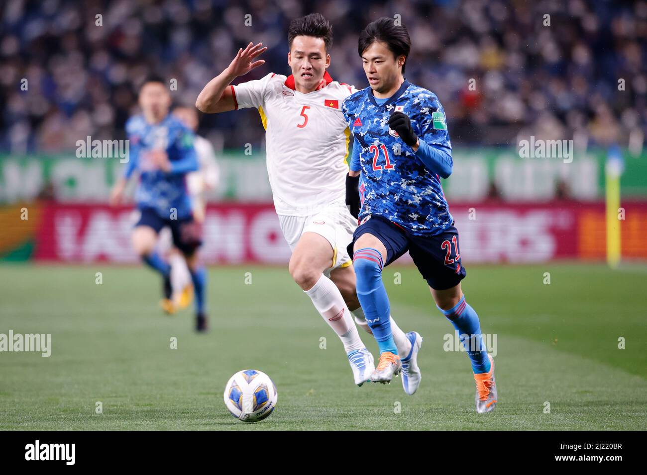Saitama Japan 29th Mar 22 Bui Hoang Viet Anh 5 Of Vietnam And Kaoru Mitoma 21 Of Japan Compete For The Ball Duringa The Fifa World Cup Qatar 22 Afc Asian Qualifiers