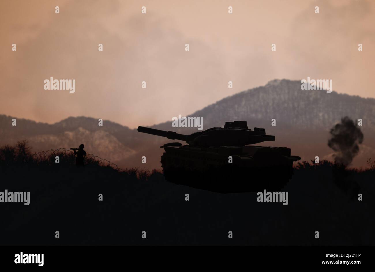 Main battle tank on a battlefield. Armored units in a battle. Stock Photo
