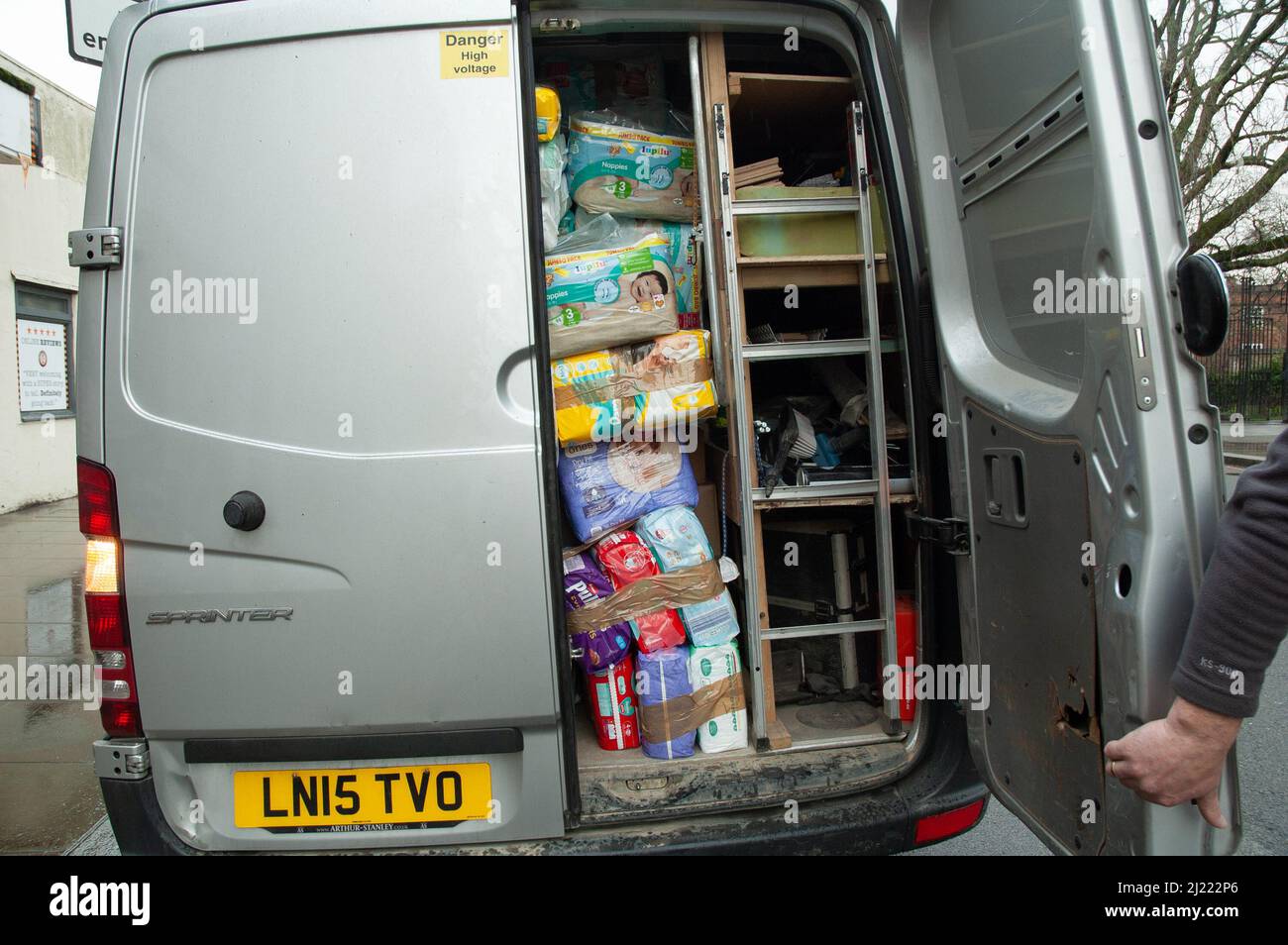 A van loaded up with donations outside Prosperity restaurant, Twickenham, UK. The cafe has become a hub for donations to Ukraine since the start of the invasion in February 2022. Credit: Tricia de Courcy Ling/Alamy Live News Stock Photo
