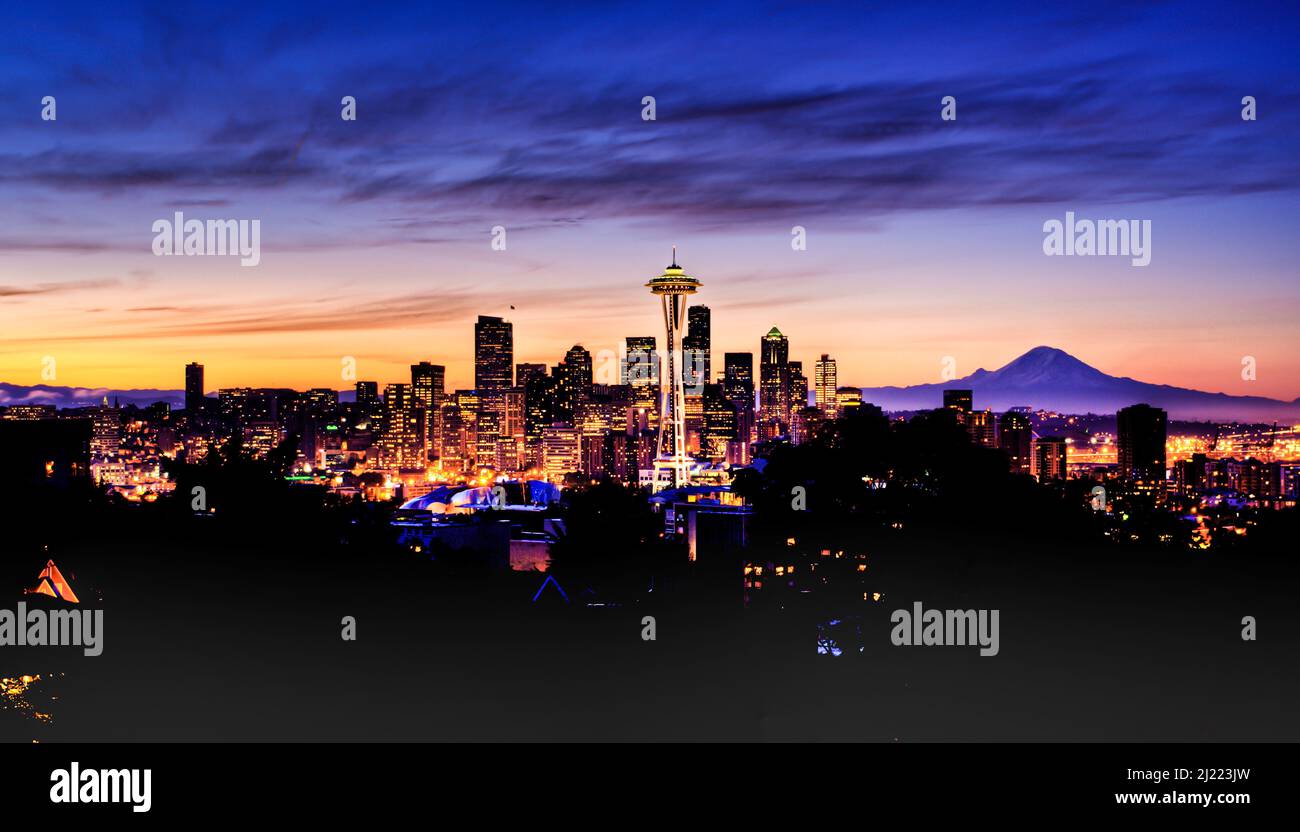 Mount Rainer seen behind modern Seattle skyline in a colourful winter ...