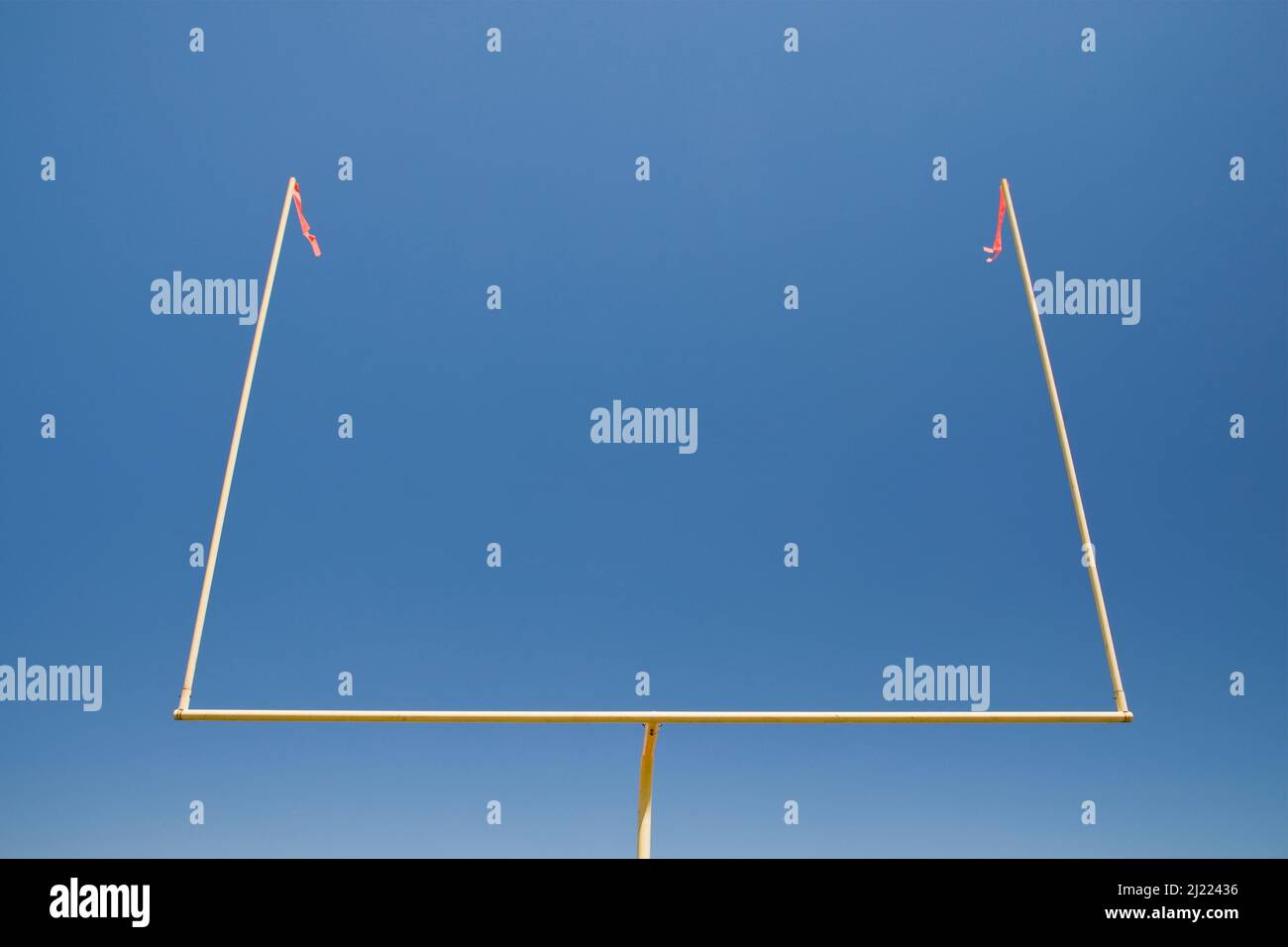 The upright shilouette of the scoring area of Football field goal posts