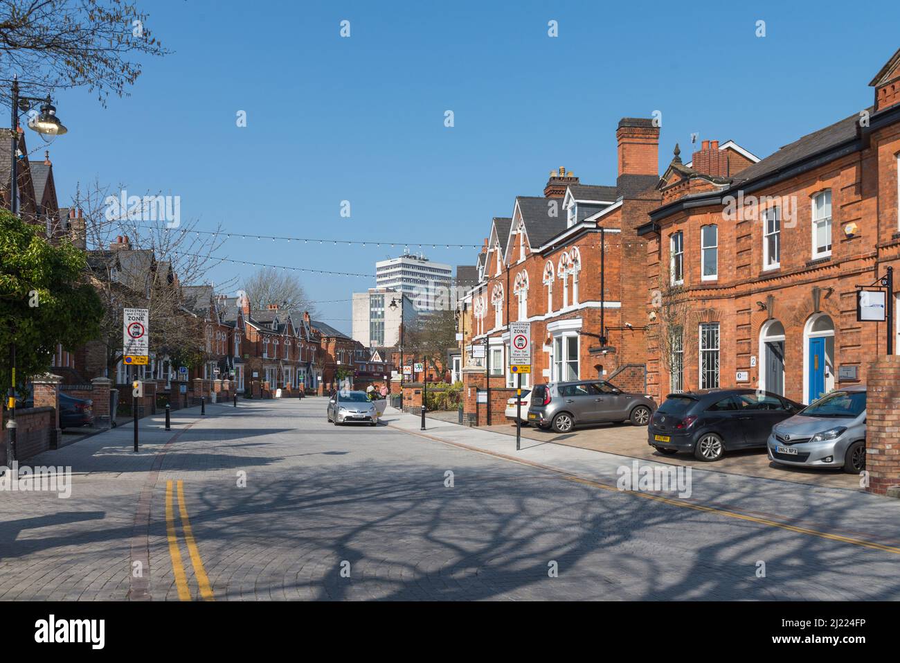 Greenfield Crescent in Edgbaston, Birmingham is home to various small businesses and bars, cafes and restaurants Stock Photo