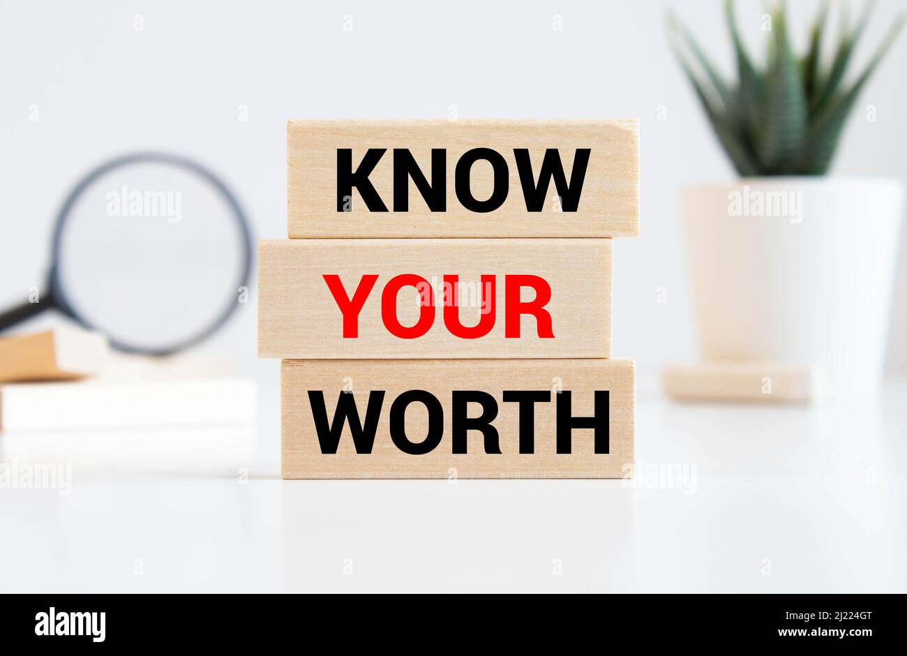 Know Your Worth on wooden blocks. Self motivation coaching HR concept Stock Photo