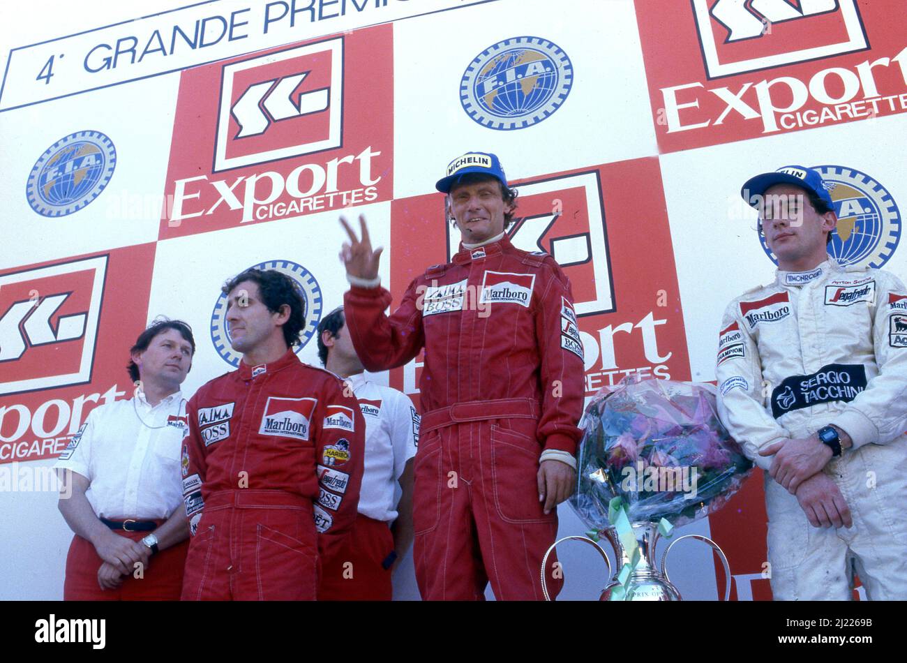 Niki Lauda (AUT) McLaren 2nd position and World Trichampion Alain Prost