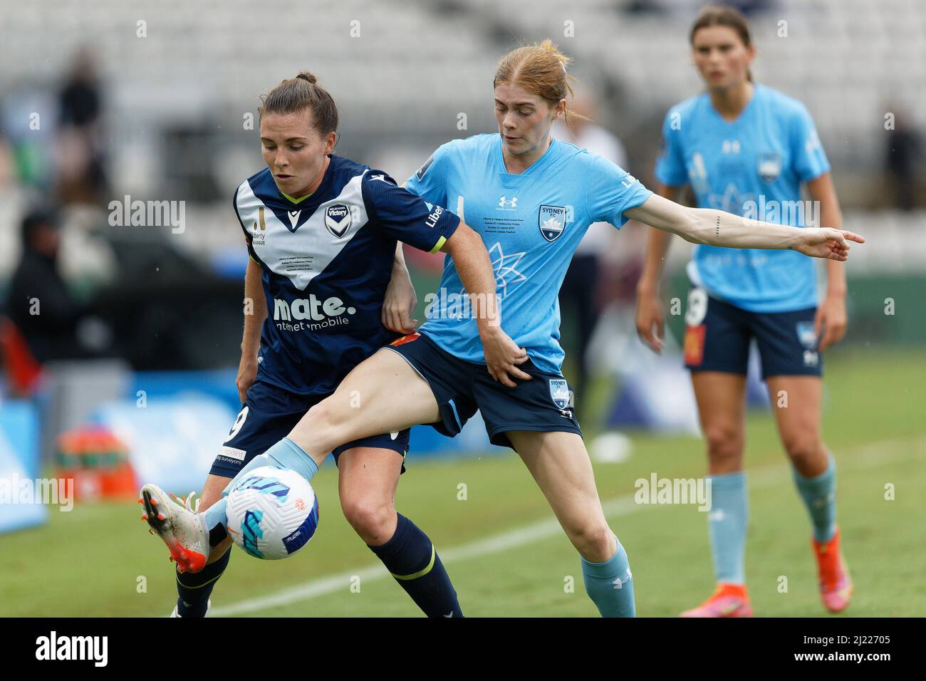 Catherine Zimmerman of Melbourne Victory is challenged by Cortnee Vine of Sydney FC during the A-League Womens Grand Final match between Sydney FC and Stock Photo