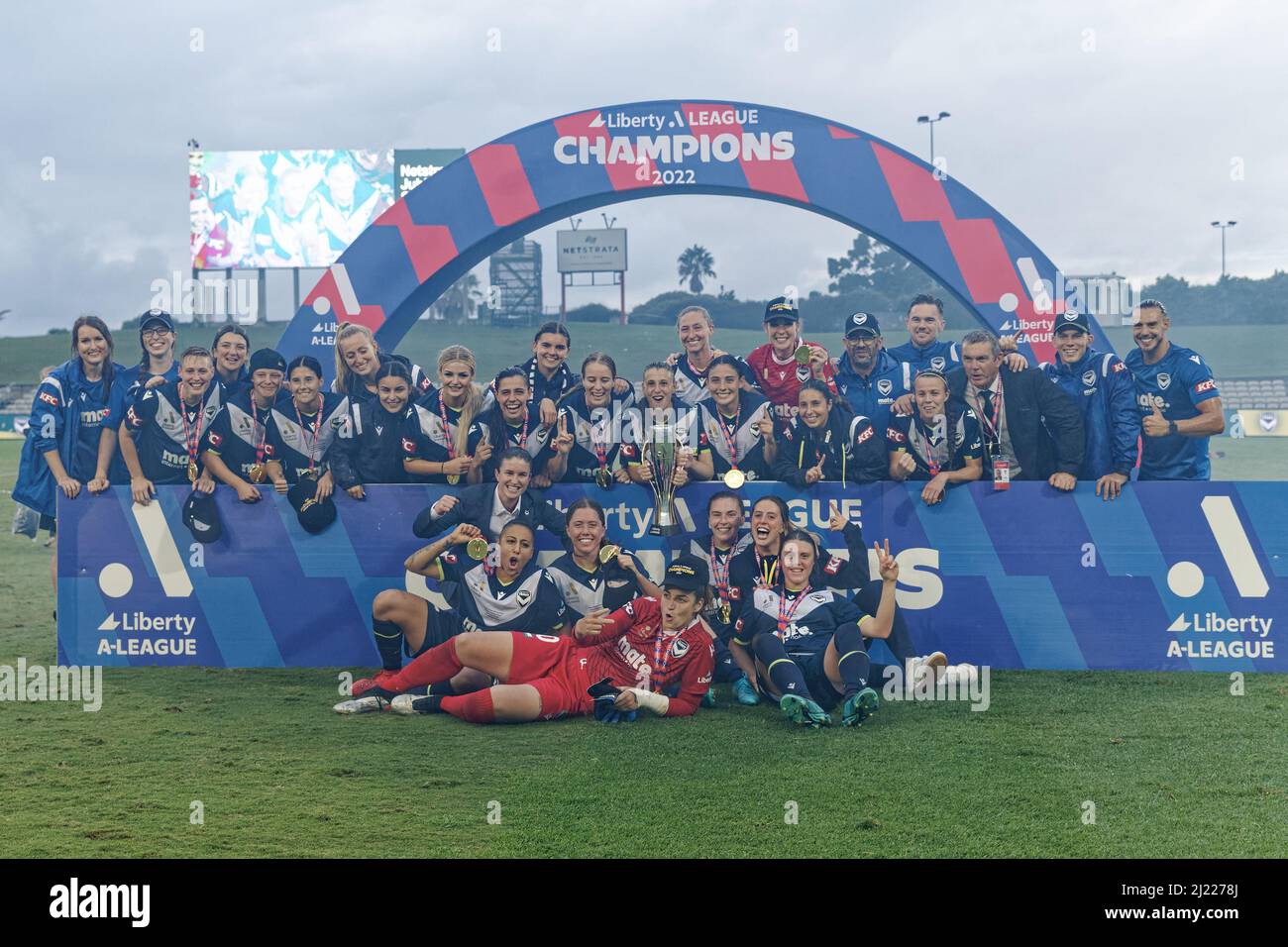 The Melbourne Victory players and staff celebrate during the presentation ceremony after winning the Womens Liberty A-League Grand Final match between Stock Photo