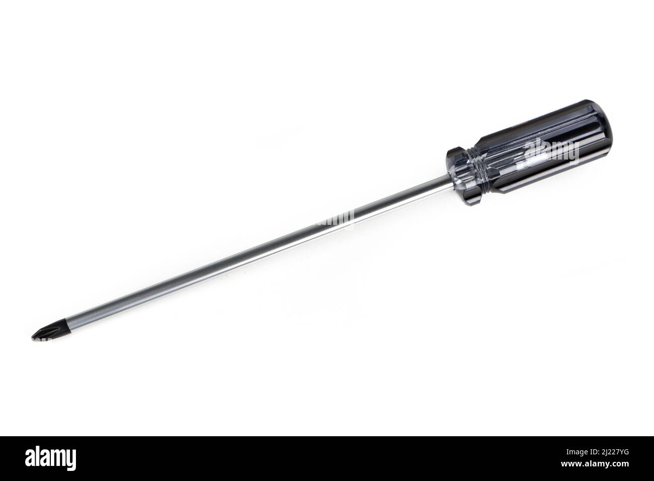 Extra long flat tip metal screwdriver, isolated on white Stock Photo
