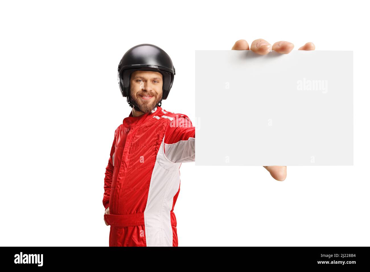 Racer holding a blank card in front of camera isolated on white background Stock Photo