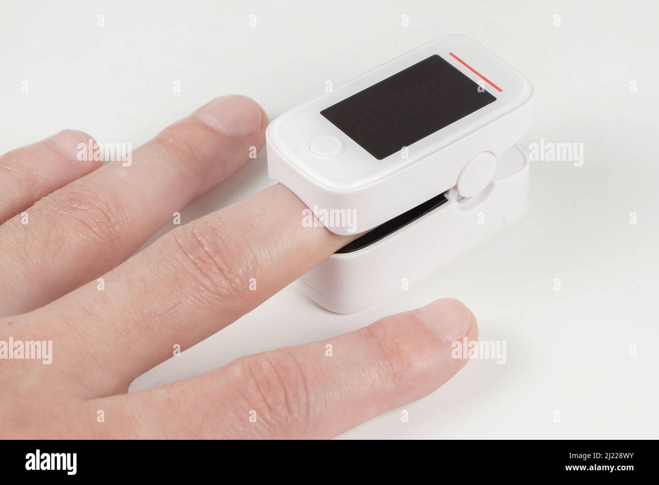 A pulse oximeter used to measure pulse rate and oxygen levels Stock