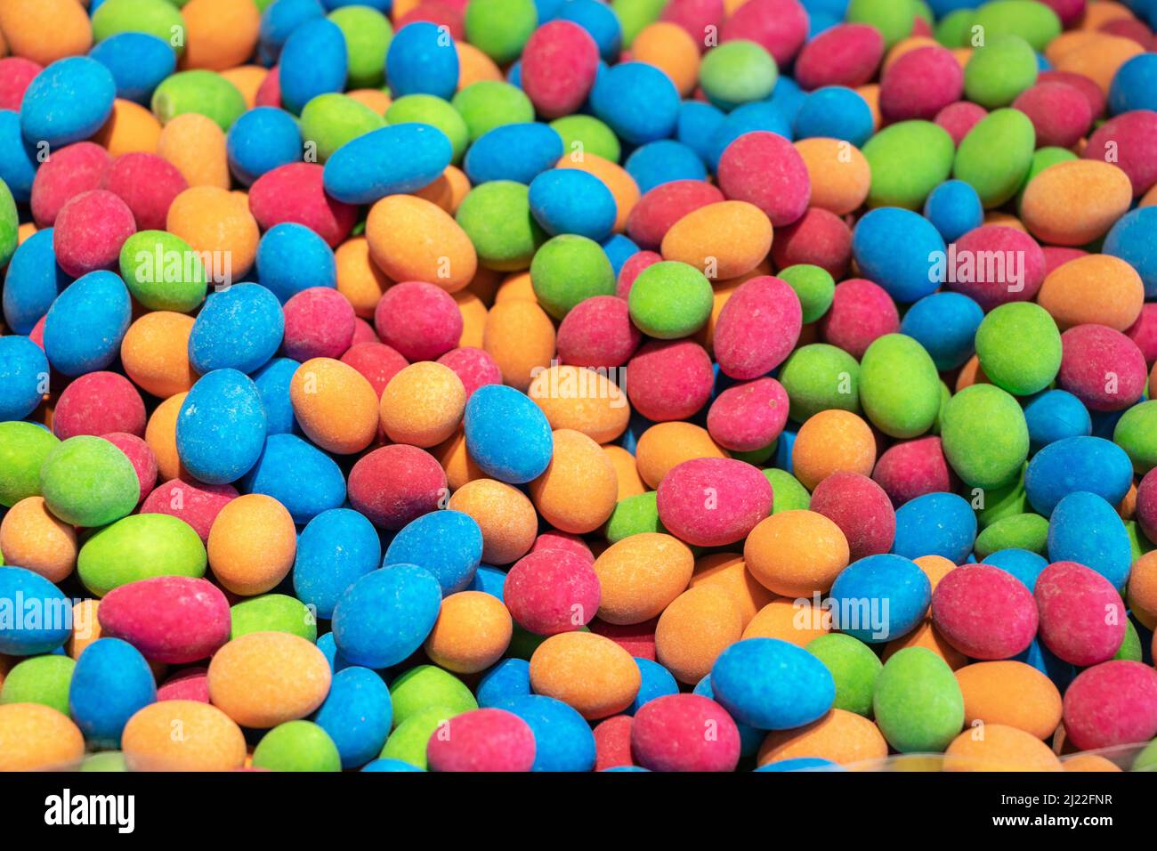 Multicolored jelly stick candies textured background. Stock Photo