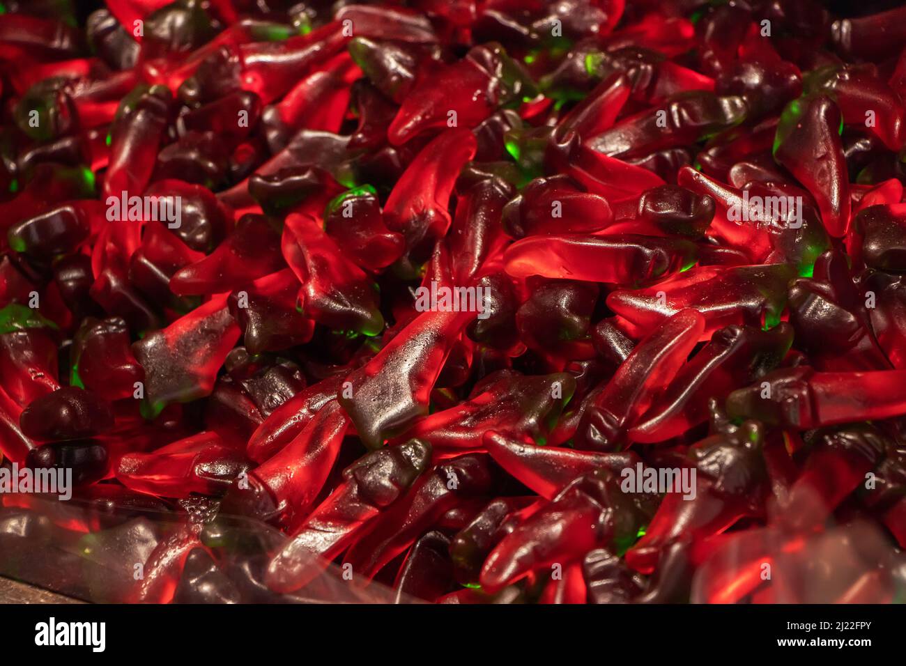 Multicolored jelly stick candies textured background. Stock Photo