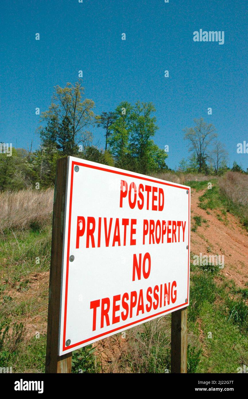 Keep out no trespassing on private property sign on commercial location in  country Stock Photo - Alamy