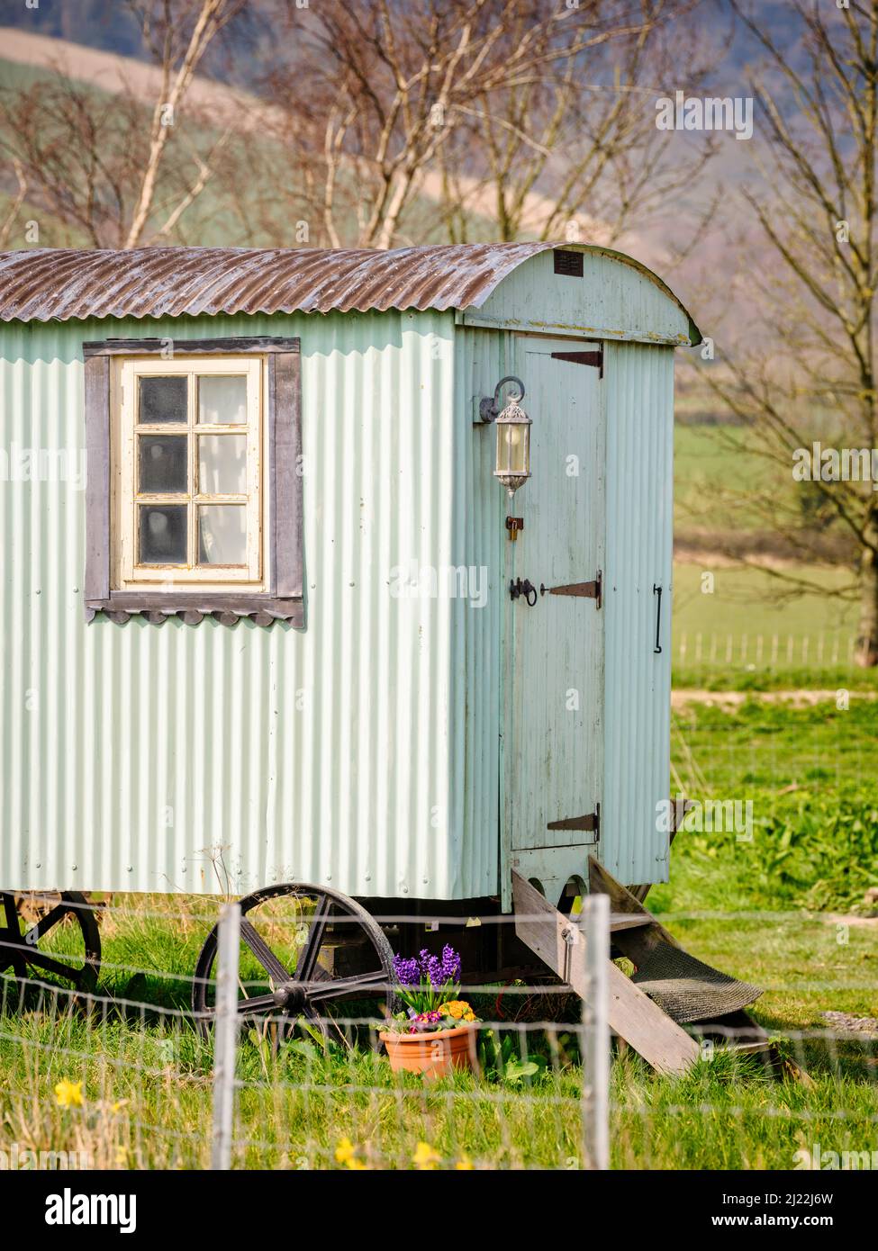 A shepherd's hut on The South Downs Way at Manor Farm, Cocking, West Sussex. Stock Photo