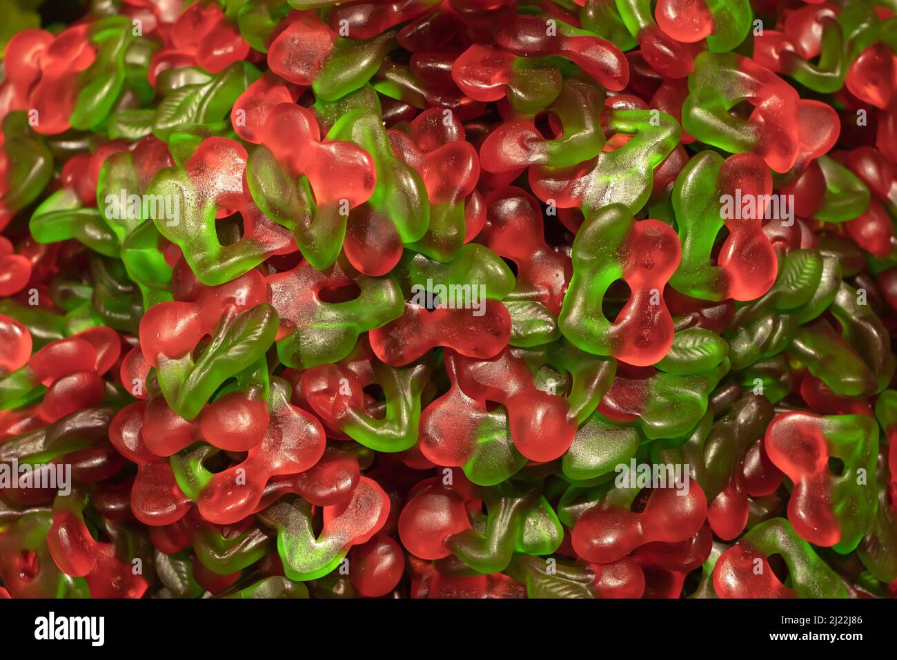 Multicolored jelly stick candies textured background. Stock Photo