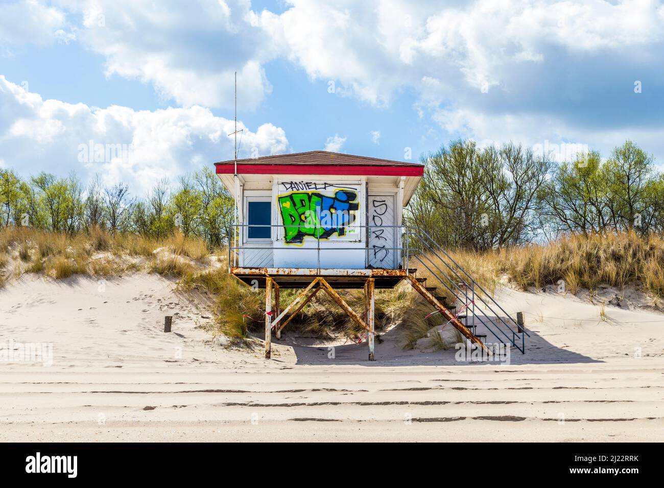 Koserow, Usedom - April 13, 2014: beach hut with Grafity in Koserow, Usedom. The tourist season starts end of April and the beach huts are cleaned of Stock Photo