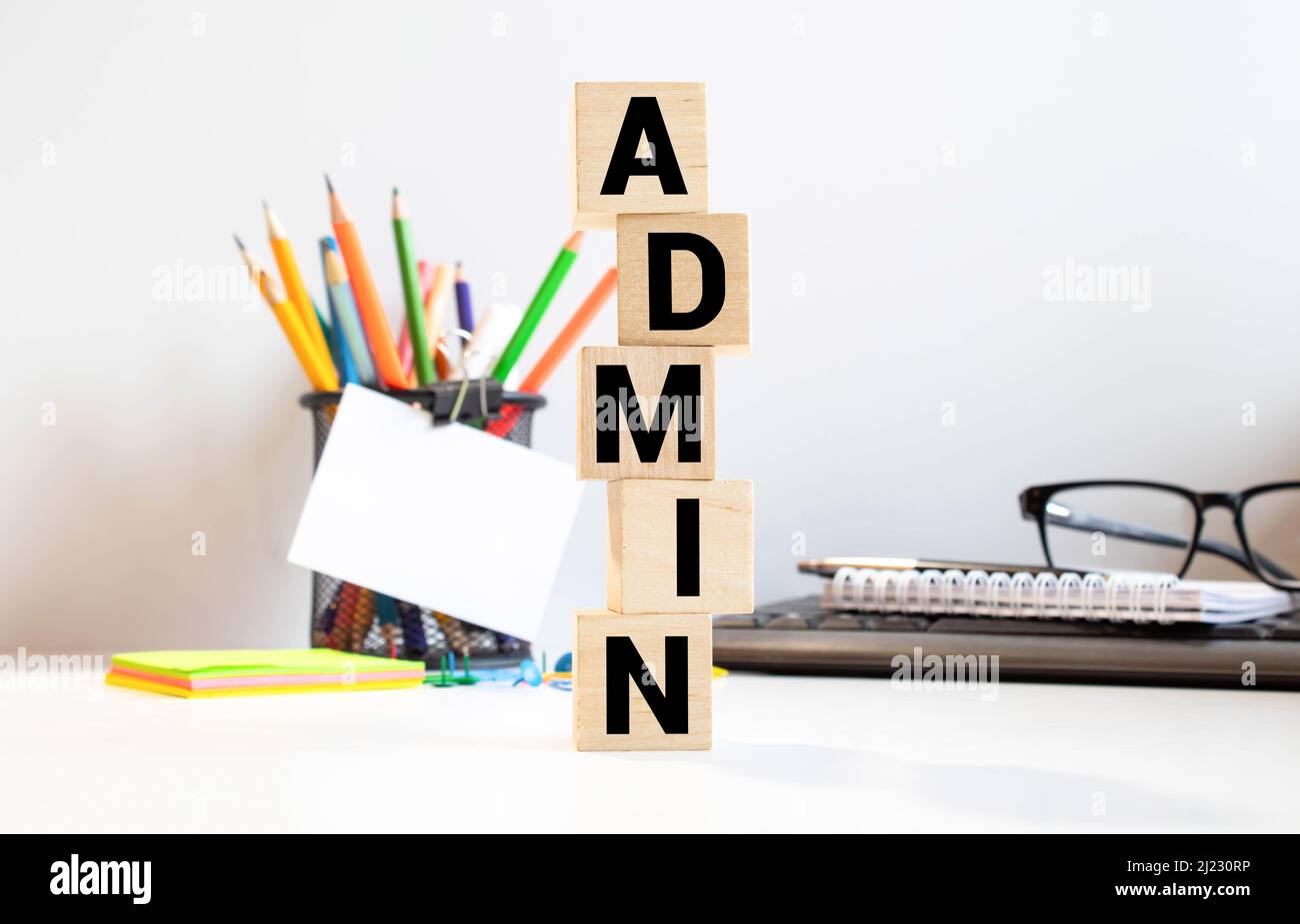 ADMIN word made with building blocks isolated on white. Stock Photo