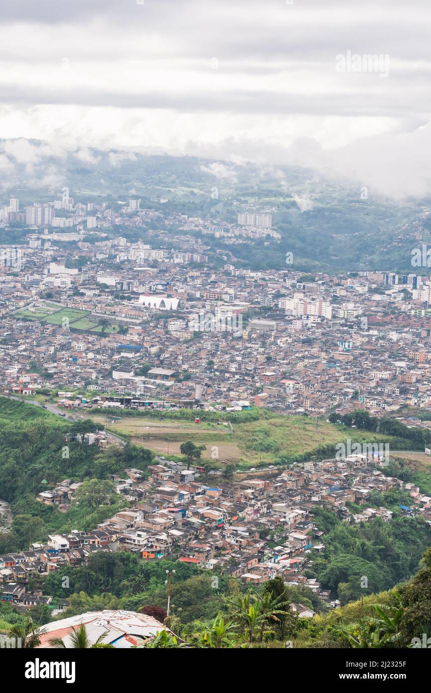 view of the city of Pereira-Colombia from the top of the mountain. urban area bordering the municipality of dosquebradas and pereira in view of the ne Stock Photo
