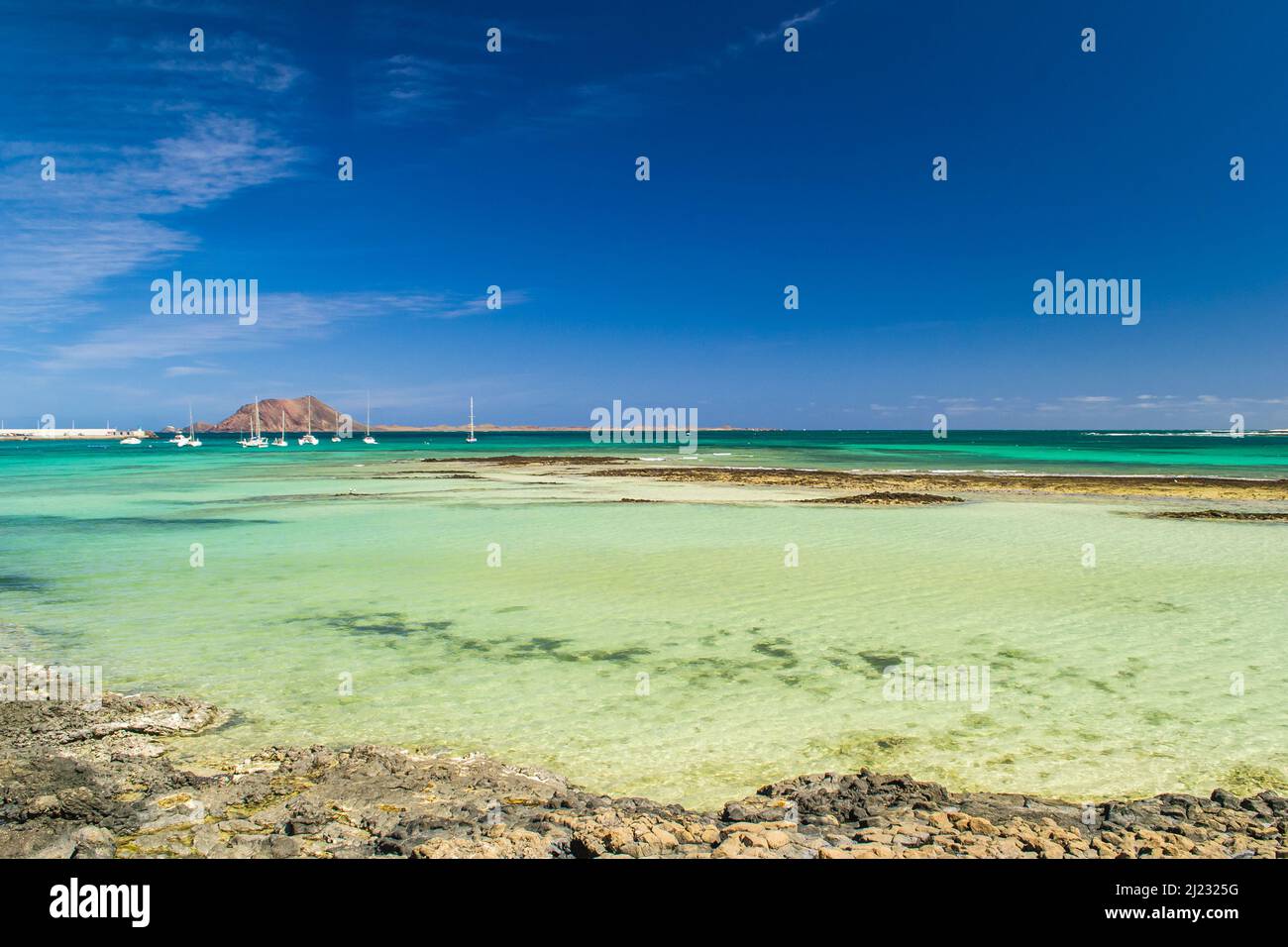 The view from the Playa Vista Lobos (white sand beach) in Corralejo,  Fuerteventura Stock Photo - Alamy