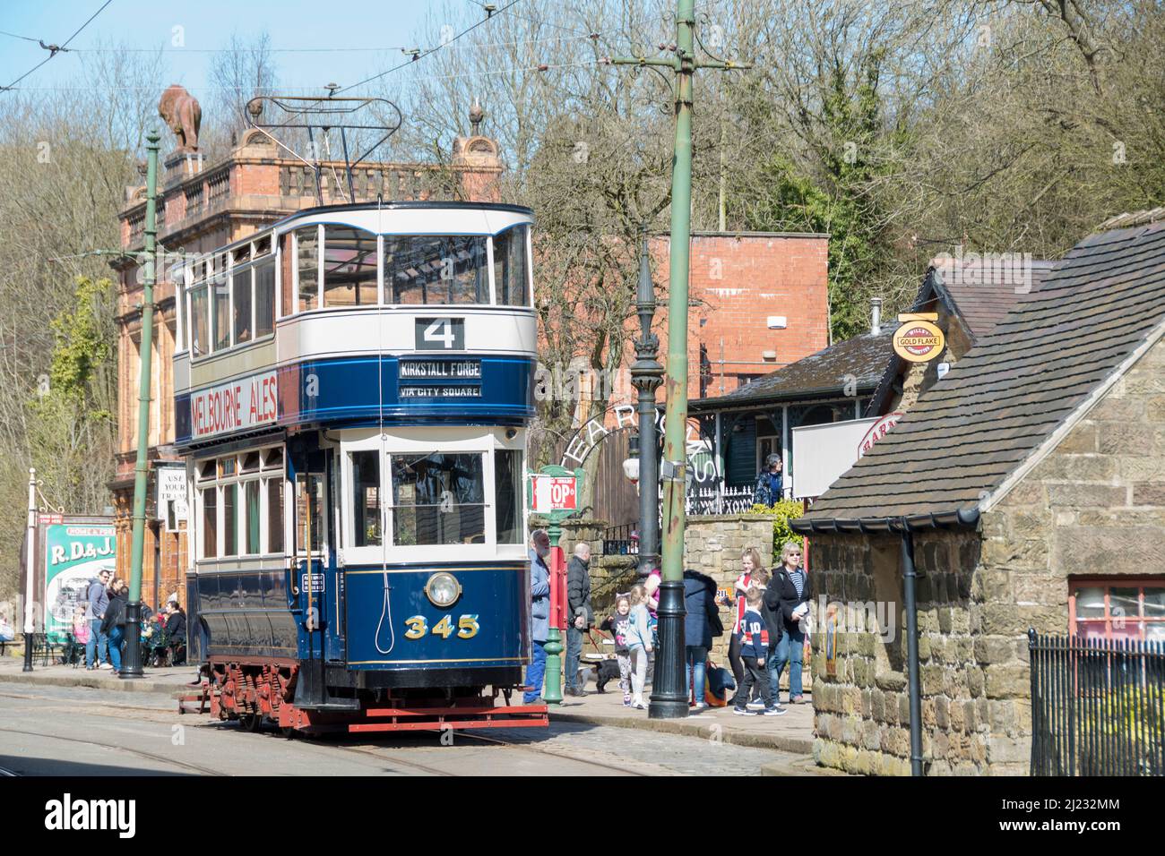 Derbyshire, UK – 5 April 2018: The 345 double decker vintage tram at the Red Lion tram stop, Crich Tramway Village Stock Photo
