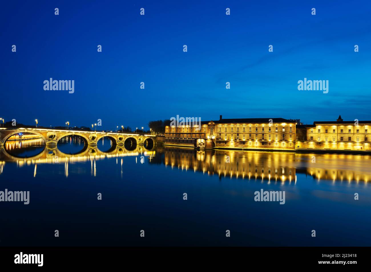 Famous view of Pont Neuf by night, Toulouse. Stock Photo